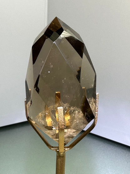 Faceted Smokey Quartz on stand