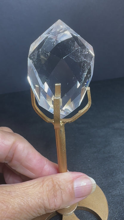 Faceted Clear Quartz on gold stand