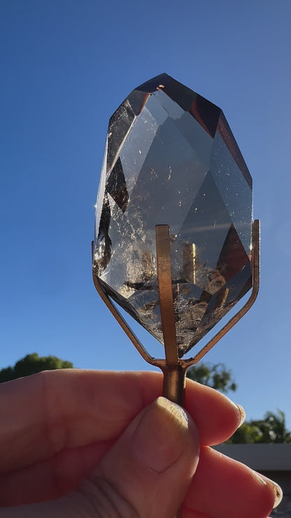 Faceted Smokey Quartz on stand